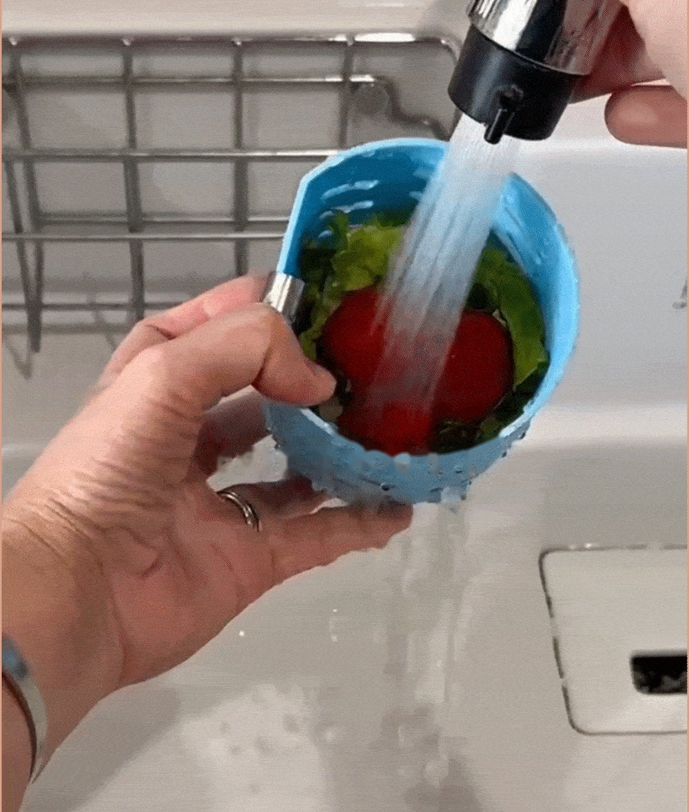 Rinsing produce under the tap right in the colander