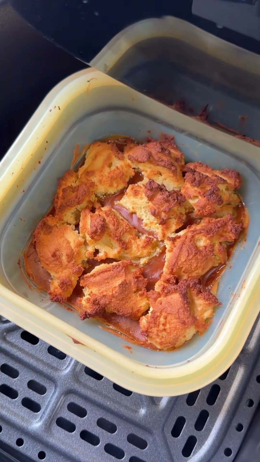 Peanut butter crumble bars baked in a yellow PushLock inside an air fryer basket