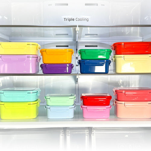 KEEPER TEN lunchboxes stacked inside a refrigerator