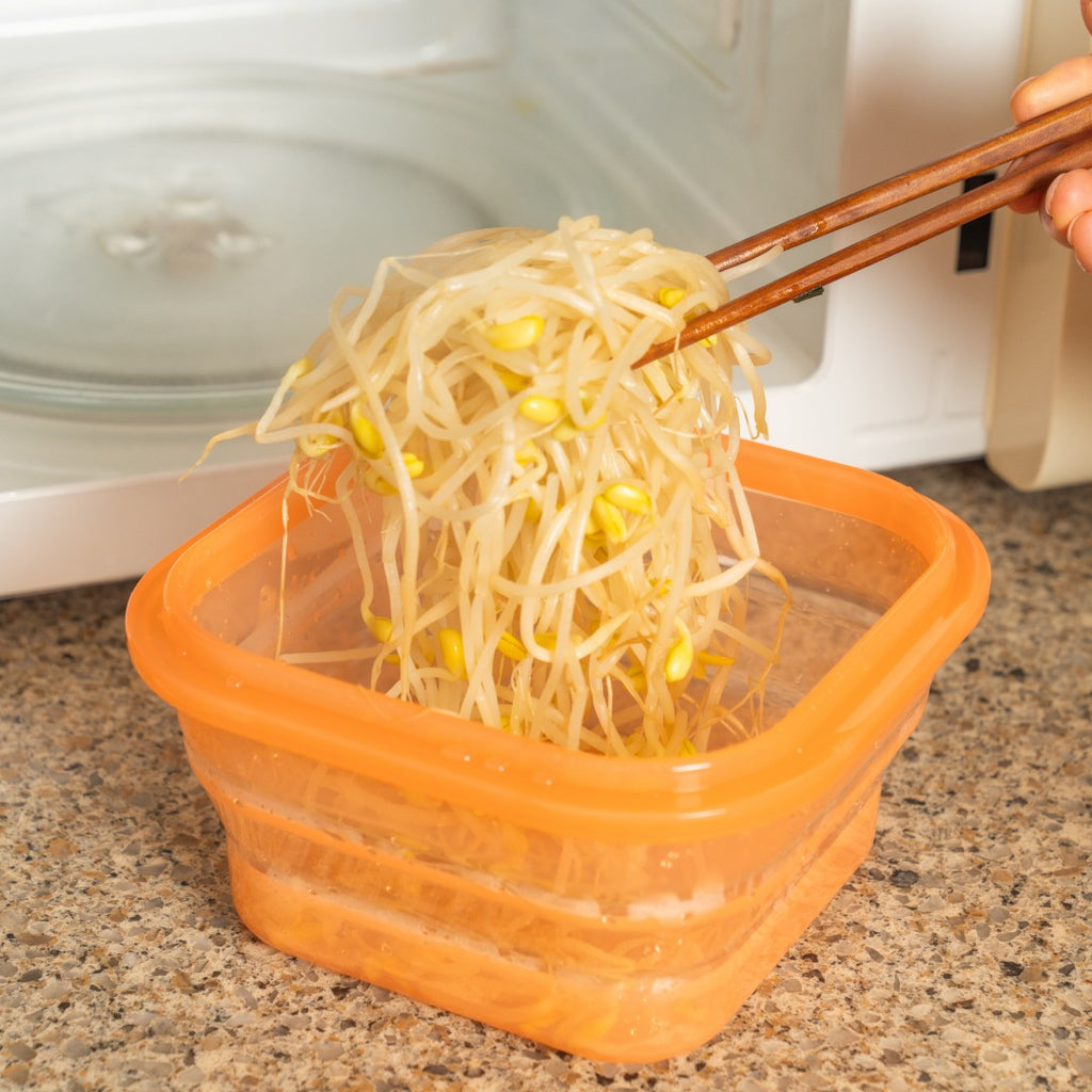 Noodles lifted from a PushLock with chopsticks