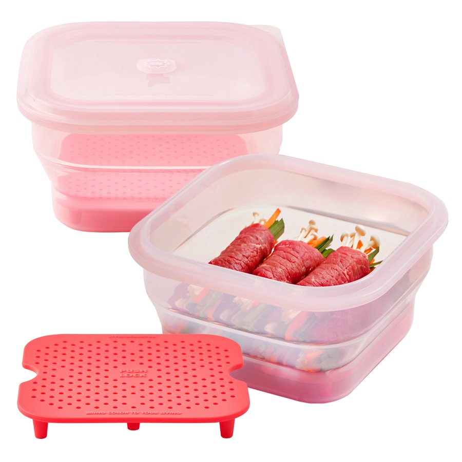 A pink PushLock 61 oz with a red steam tray and beef rolls
