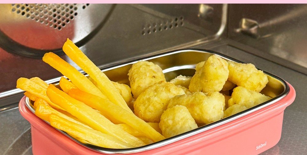 A pink KEEPER TEN inside a microwave